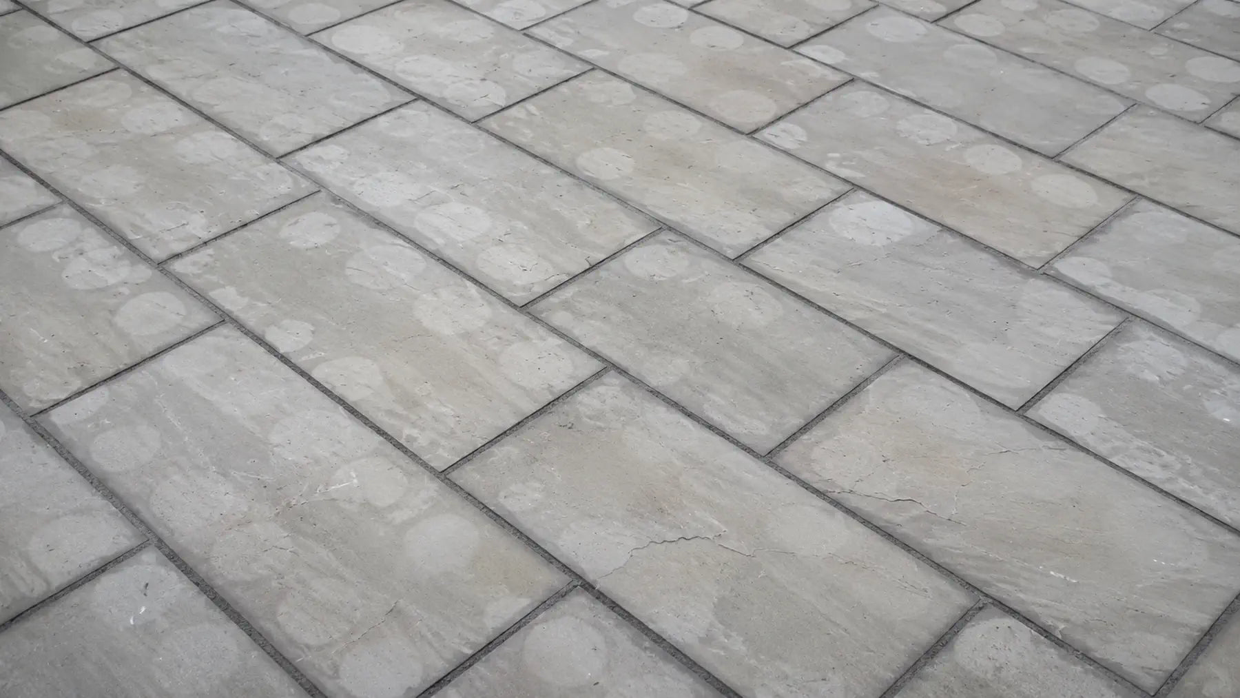 Spot and Circular Reflective Patterning in Natural Stone Paving ...