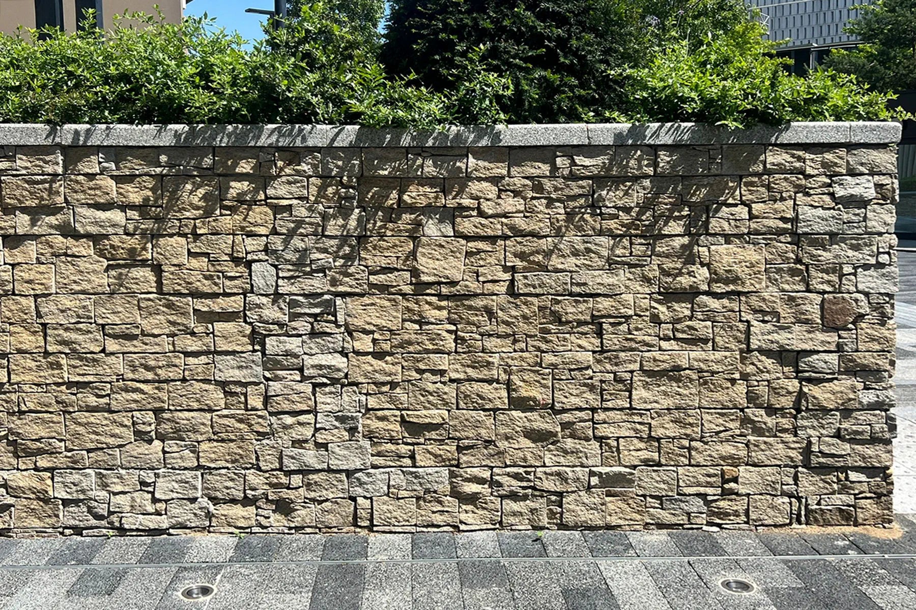 Natural stone cladding Z panels used on exterior boundary walls and landscaped developments