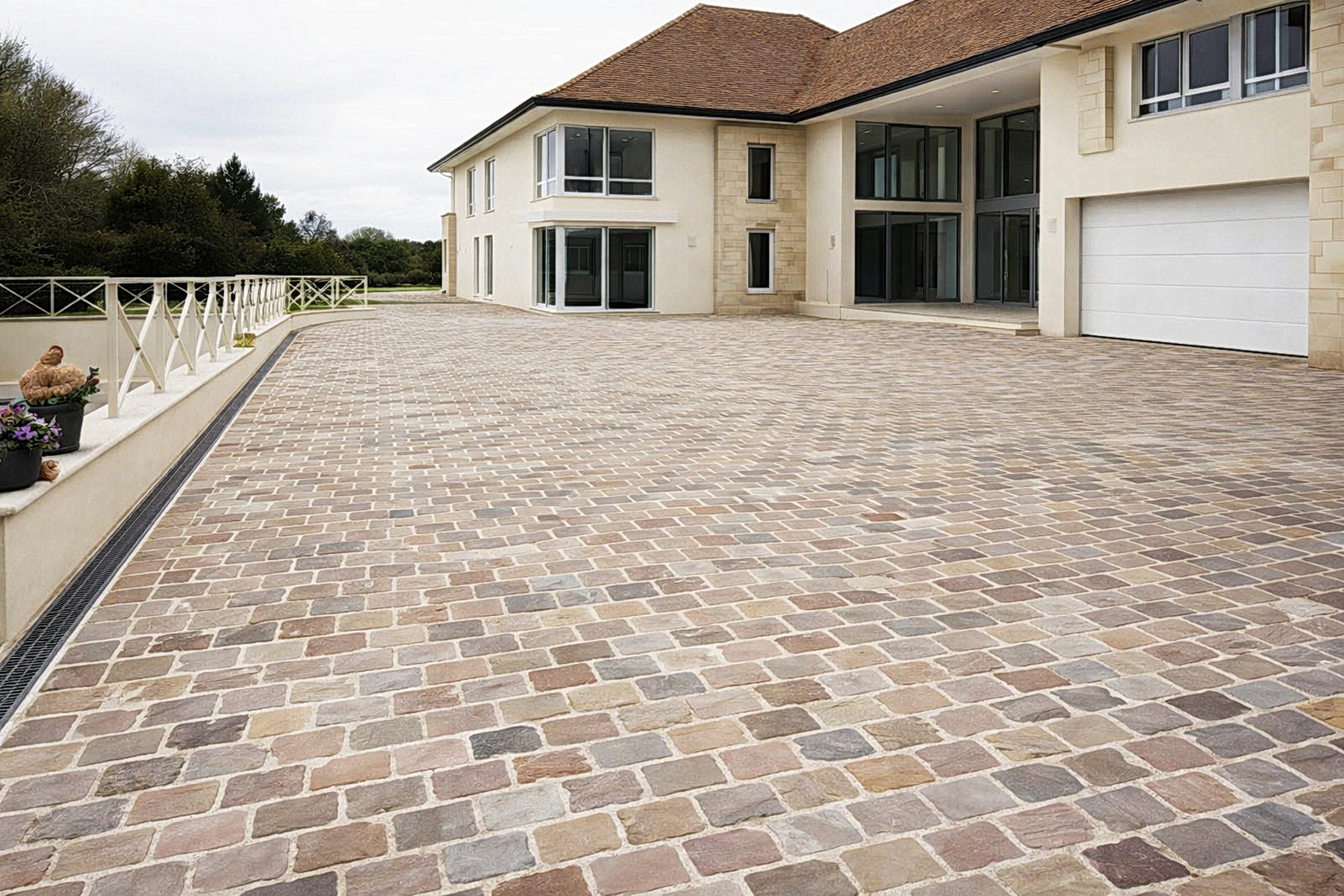 Sealed sandstone cobbles on a residential driveway