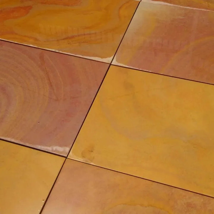 smooth Rippon buff sandstone paving slabs